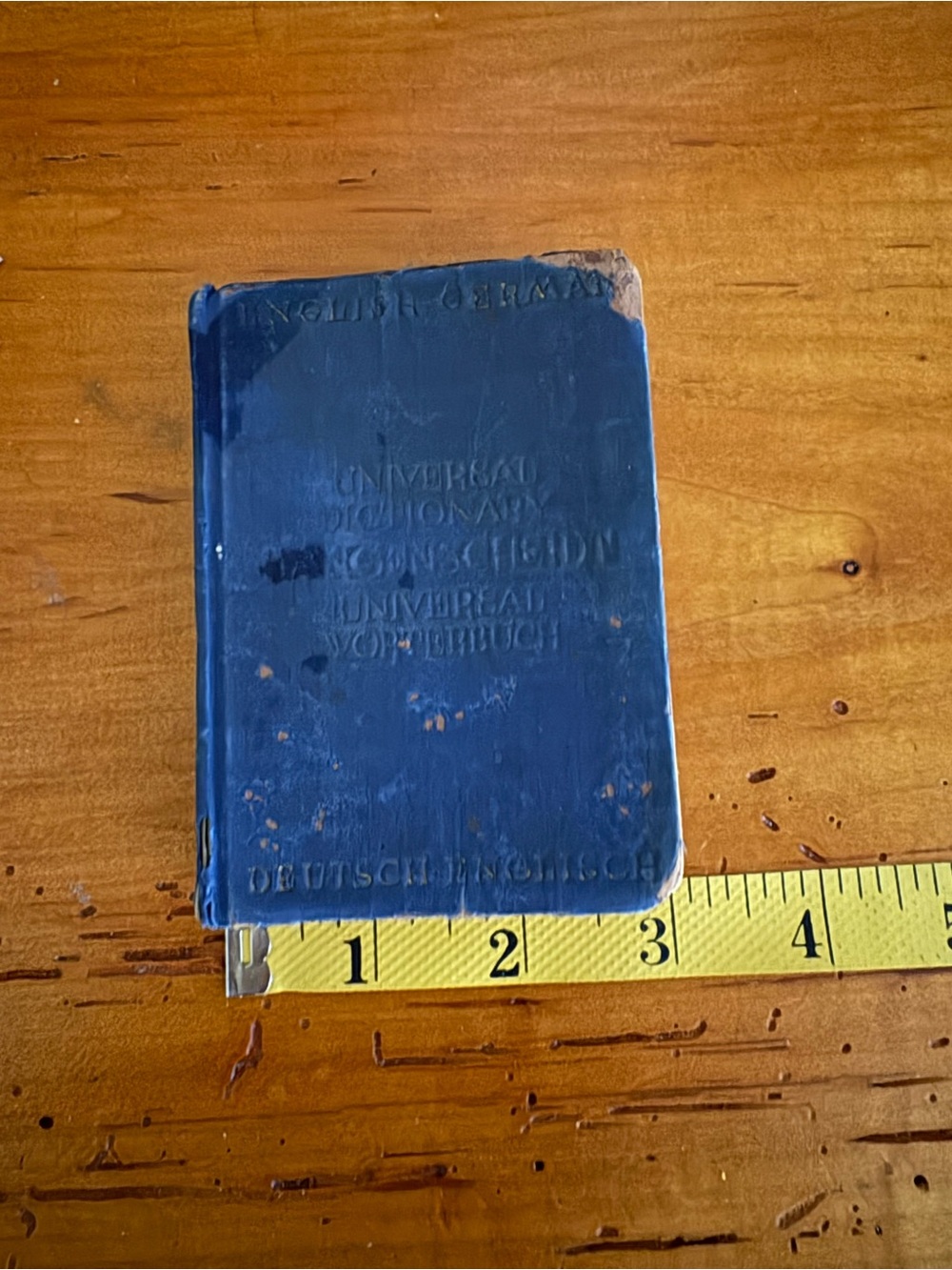 pocket-sized Langenscheidt Universal Dictionary for English-German translation